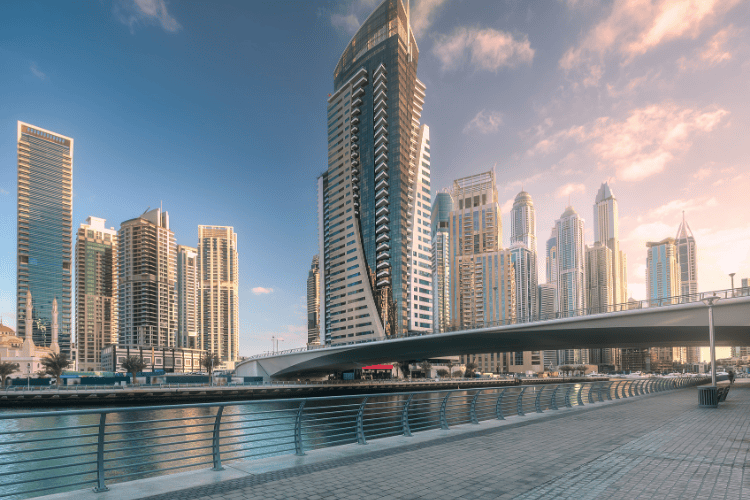 Day view of Dubai Marina bay with bridge, UAE