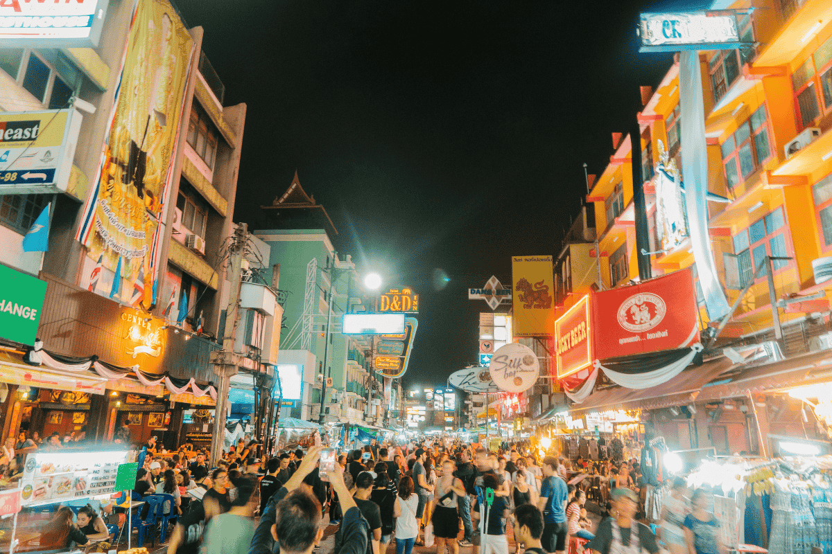 A bustling night scene on Khao San Road in Bangkok, Thailand