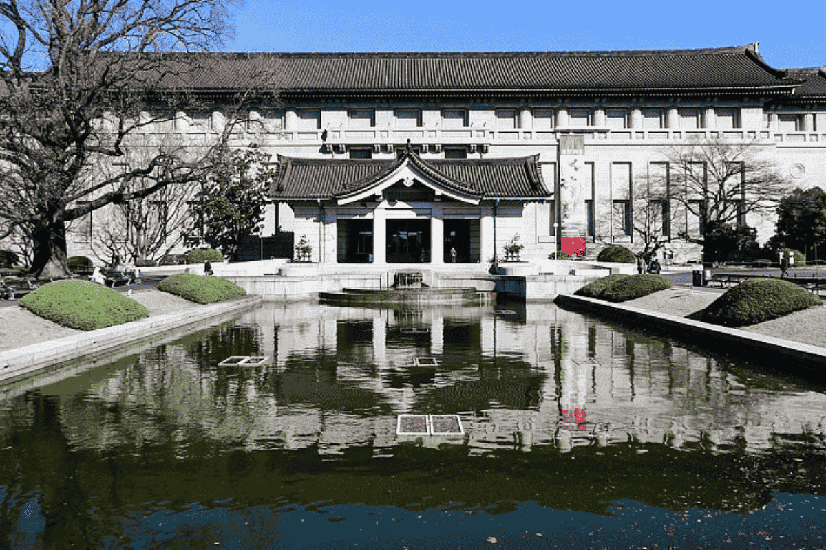 Tokyo National Museum Honkan building and reflection pond in Tokyo, Japan.
