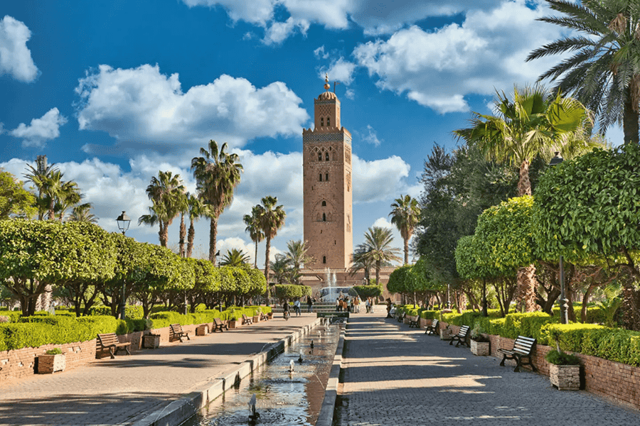 Koutoubia Mosque minaret towering over the Parc Lalla Hasna in Marrakech, Morocco